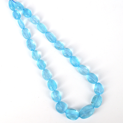 Blue Topaz Carved Strand 17-25mm