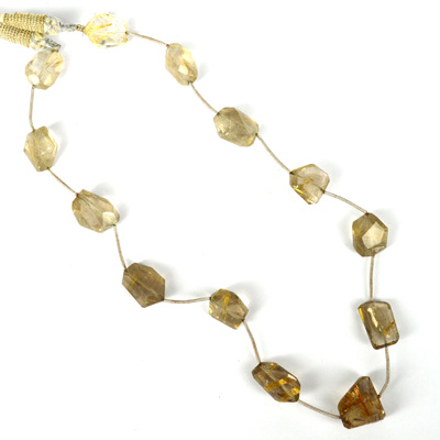 Golden Rutile Quartz Fac.Nugget app 16x11mm str 13 beads