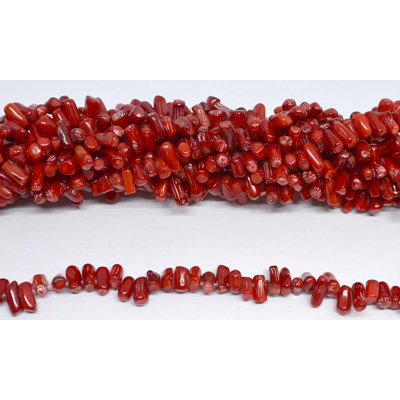 Coral red approx 5x11mm stick approx 86 beads
