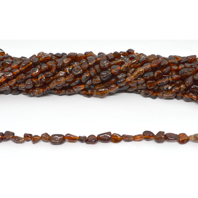 Hessonite Garnet polished nugget approx 6x8mm strand approx 55 beads